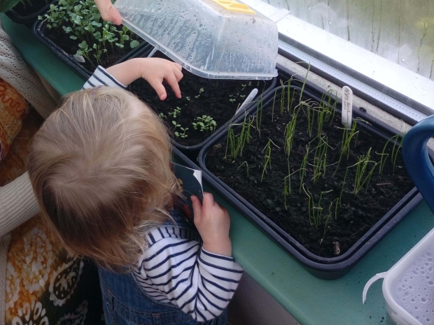Georgie's joy at growing green things!